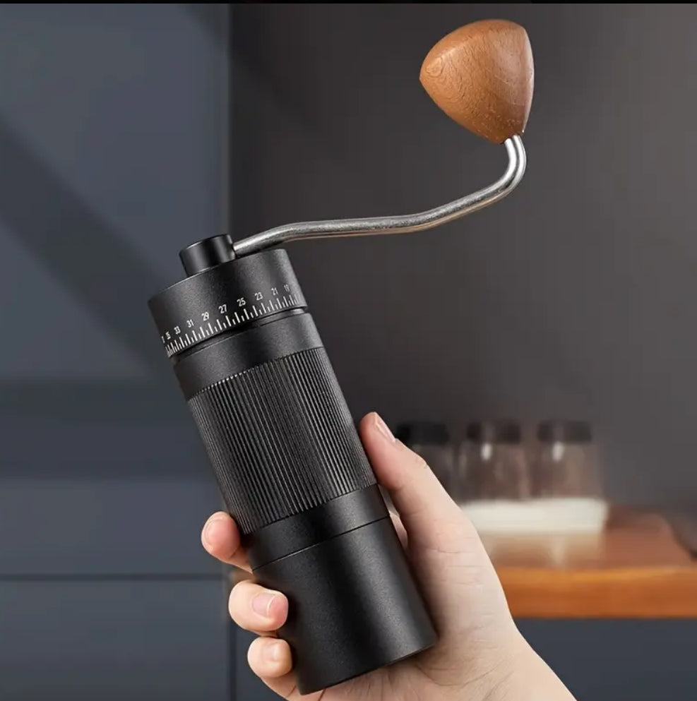 Manual coffee grinder with a five-blade stainless steel gear